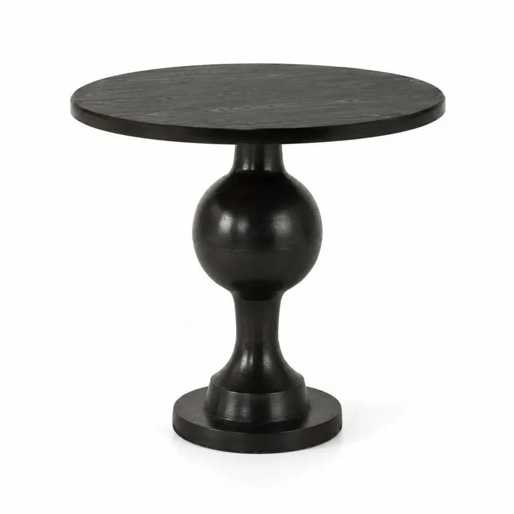 Tavolo rotondo in legno nero con base scolpita